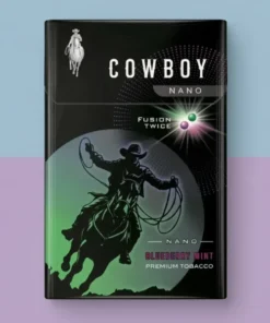 Cowboy Fusion Twice Blueberry Mint, yaban mersini aroması ve çift mentol kapsülüyle ferah ve aromatik premium sigara deneyimi sunuyor.