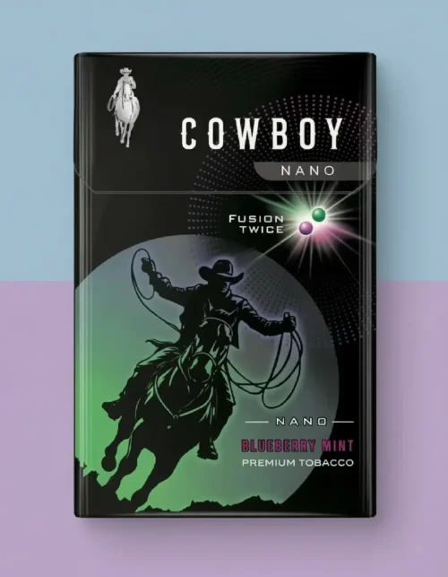 Cowboy Fusion Twice Blueberry Mint, yaban mersini aroması ve çift mentol kapsülüyle ferah ve aromatik premium sigara deneyimi sunuyor.
